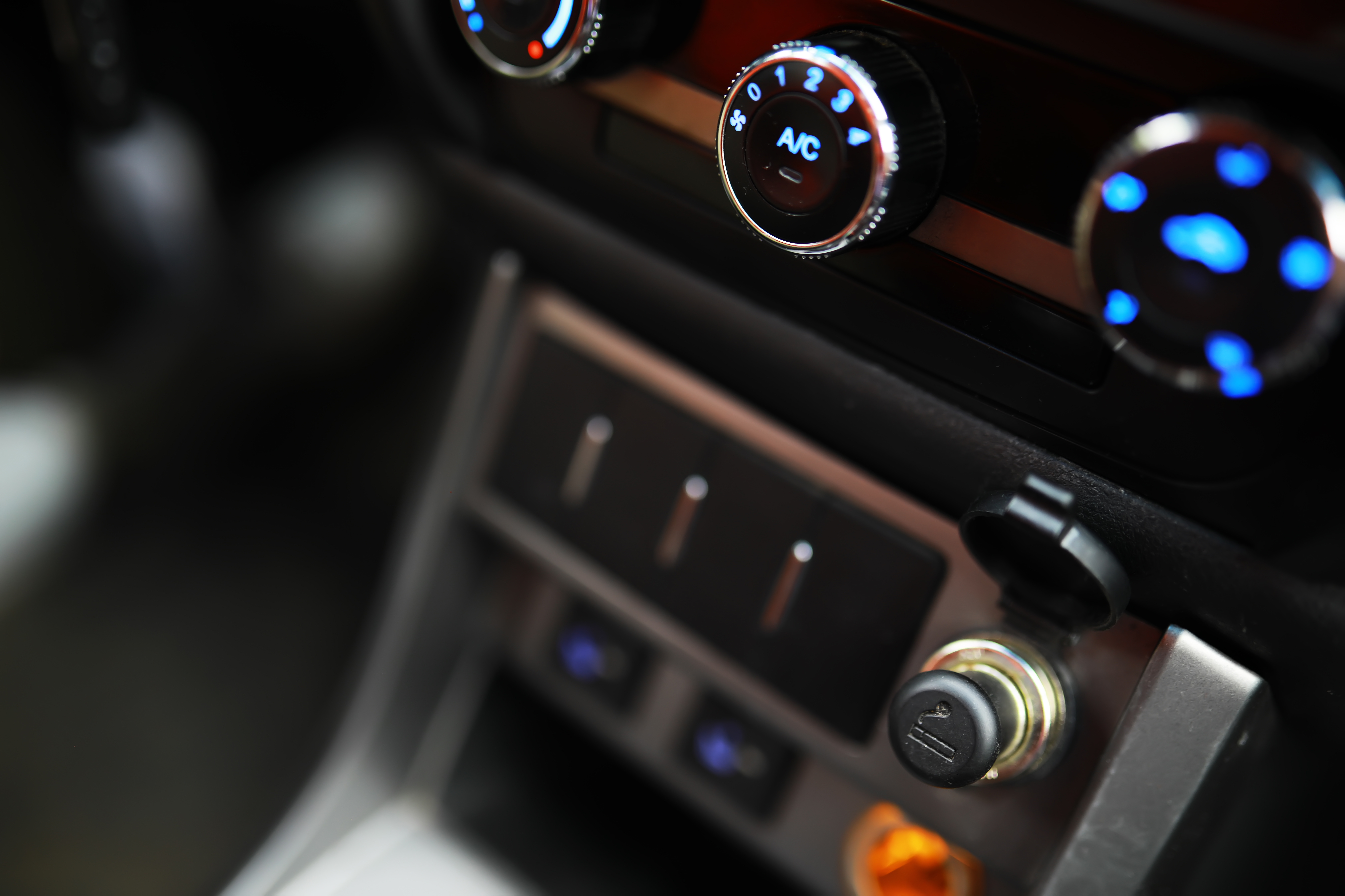 The Process of Choosing Climate Control in the Car. Various Cont